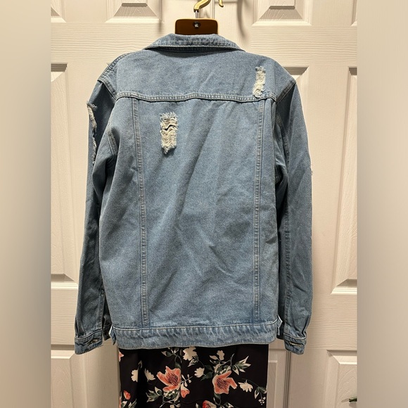 Denim jacket. Size medium. Distressed. Loose fit. - Picture 6 of 11
